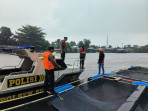 Diguyur Hujan, Polsek SKP Cooling System di Perairan Pekanbaru-Kampar