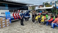 Polres Pelalawan Gelar Perpanjangan SIM Gratis, Bansos dan Program Green Policing Bersama Komunitas Ojek Online