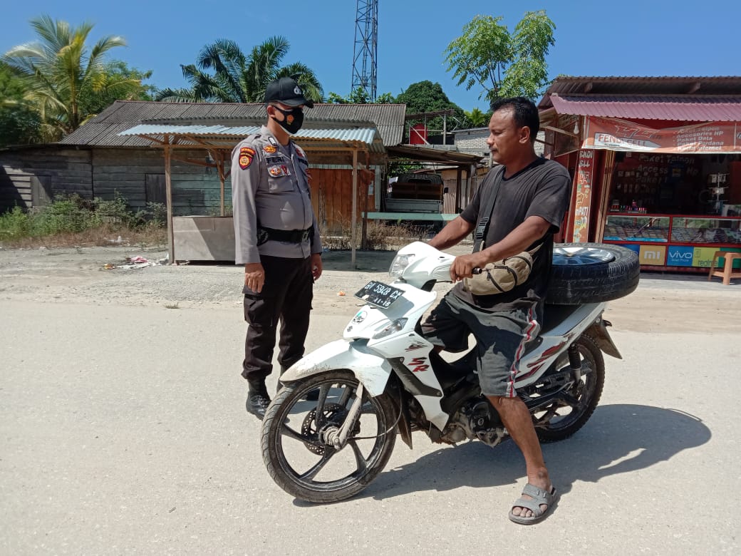 Polsubsektor Pelalawan Pantau Penerapan Prokes Masyarakat di Desa Lalang Kabung