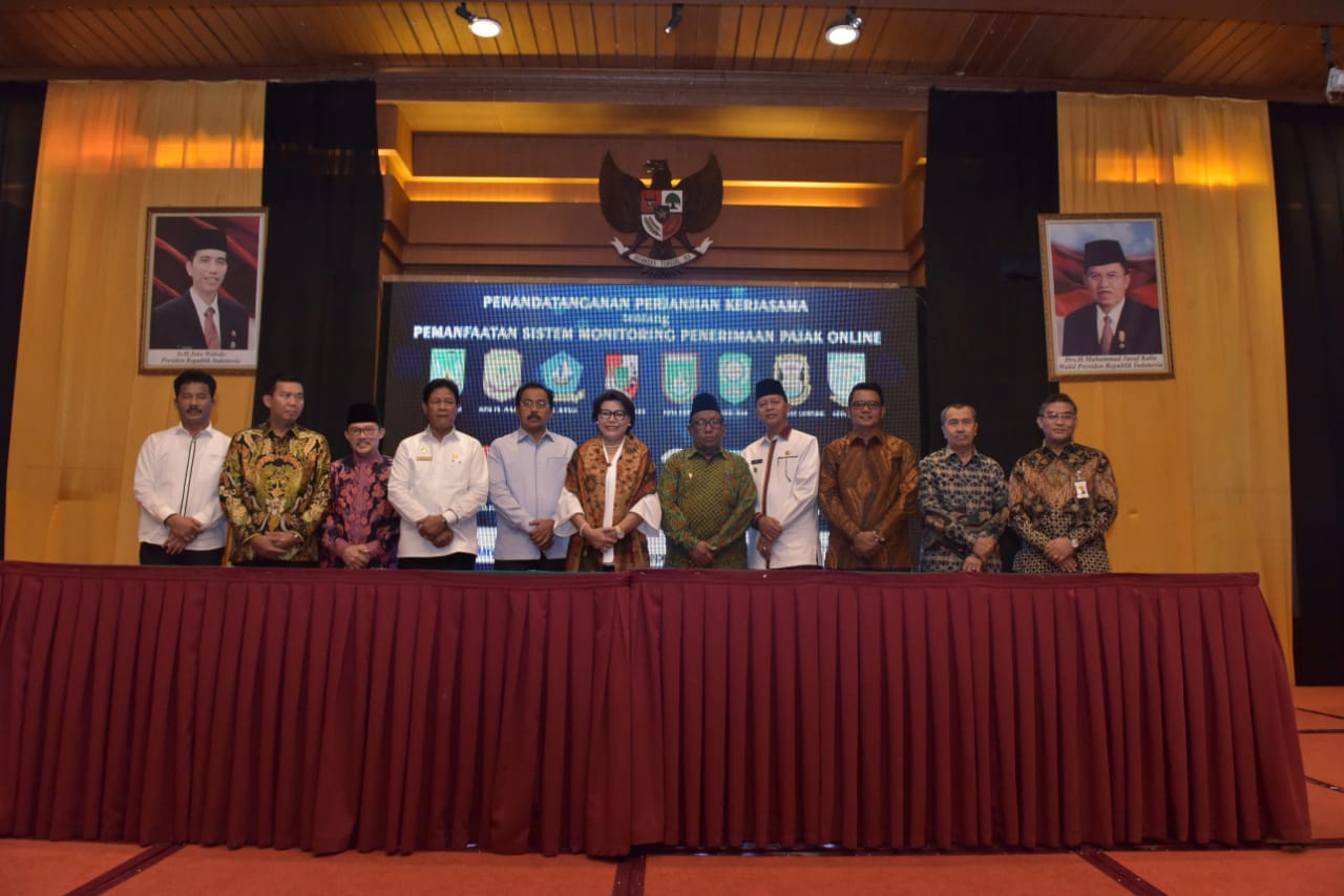 Bank Riau Kepri dan Empat BPD Lainnya Teken MoU Dengan 16 Bupati/Walikota Dihadapan KPK RI Tentang Pajak Online