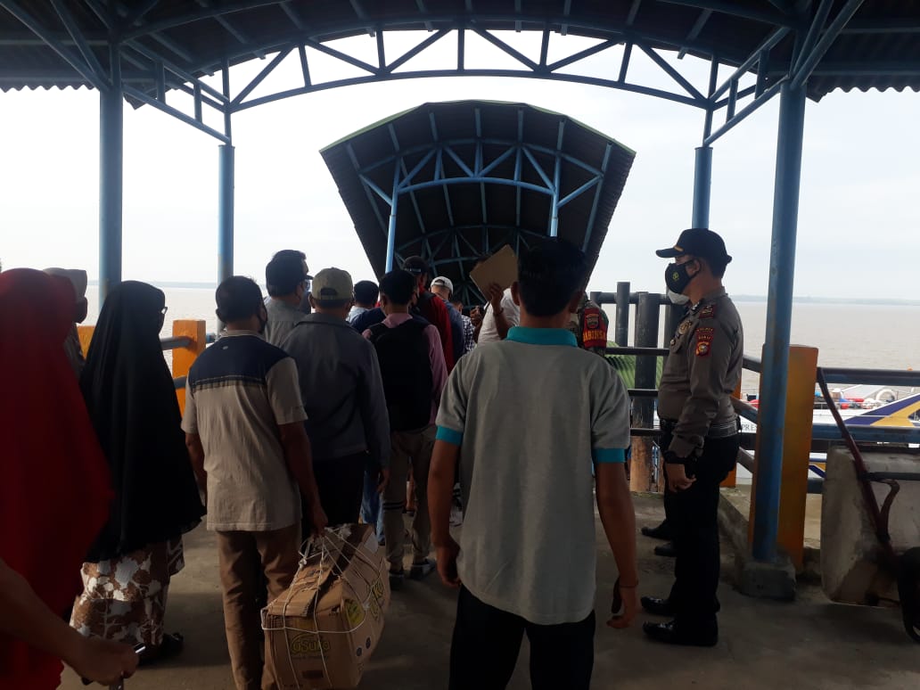 Tekan Angka Sebaran Covid-19, Polsek Kuala Kampar Siaga di Pos Pantau Pelabuhan Penyalai