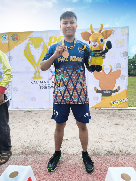 Rahmat Hidayat Raih Medali Pertama Porwanas untuk Riau di Cabor Atletik Lari 5.000 Meter