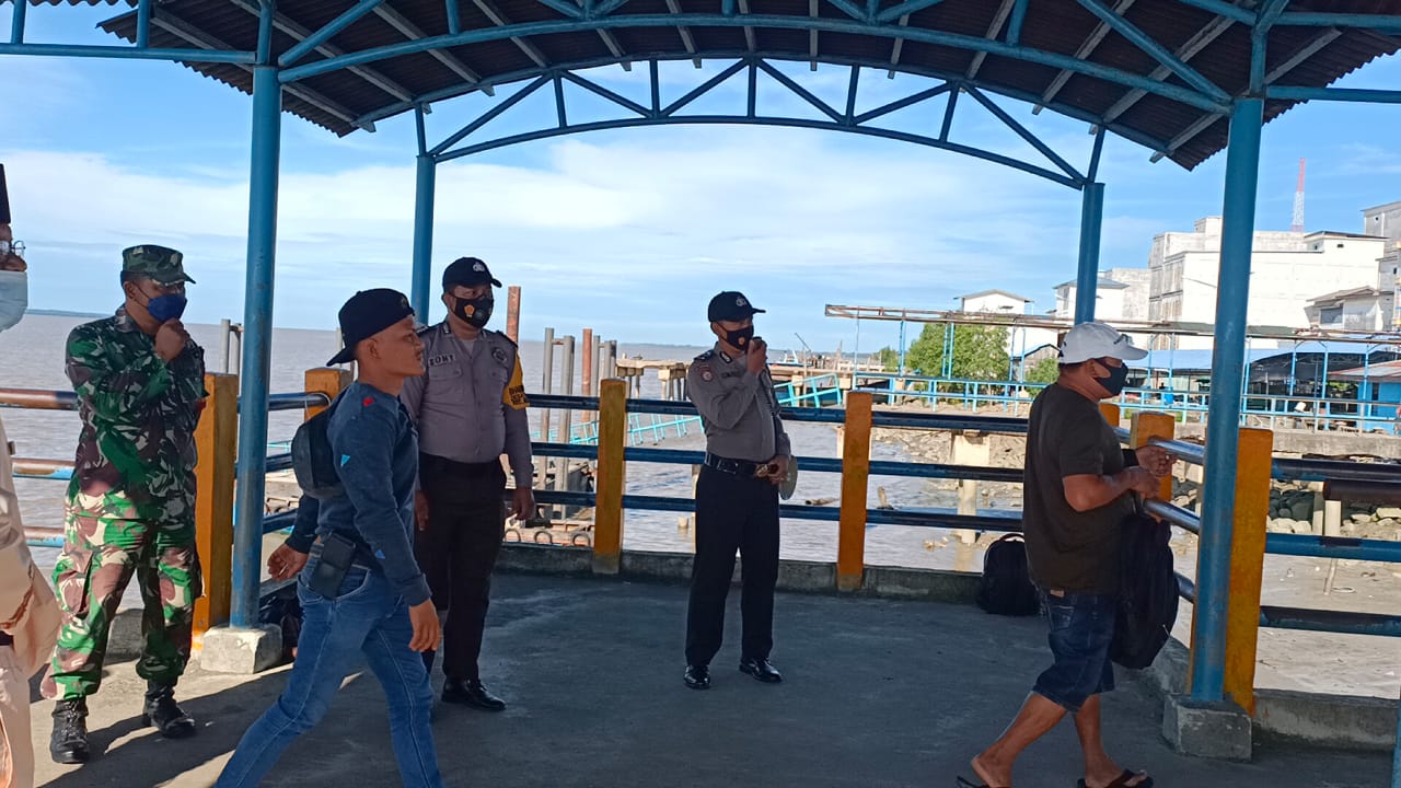 Cegah Penularan Covid-19 di Pelabuhan, Polsek Kuala Kampar Terapkan PPKM Mikro