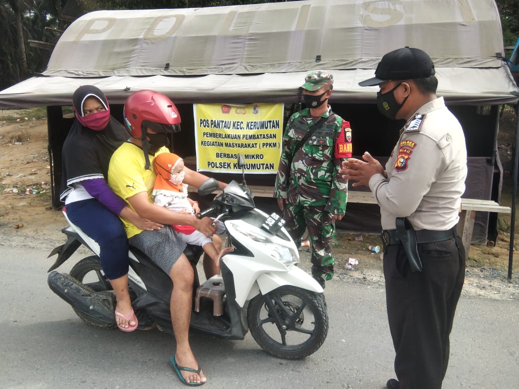 Hambat Penyebaran Covid-19, Polsek Kerumutan Lakukan Pendisiplinan Prokes