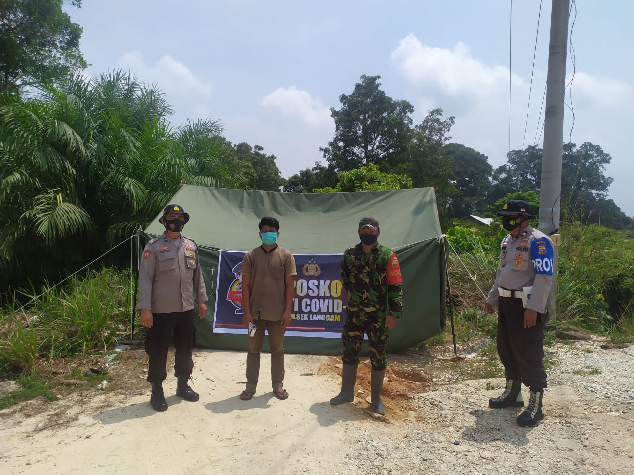 Polsek Langgam Lakukan Operasi Yustisi di Pos Pantau Kecamatan Langgam