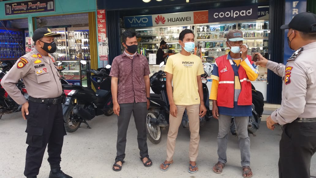 Polsek Pangkalan Kerinci Bersama TNI dan Satpol PP Gelar Operasi Yustisi