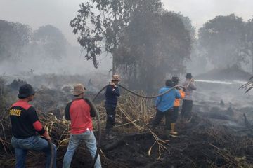 Permukiman Warga Diselimuti Asap Tipis