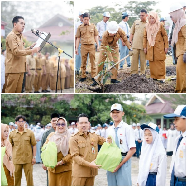 Jadi Pembina Upacara di SMKN 6 Pekanbaru, Kadisdik Riau Tanam Pohon dan Serahkan Bantuan ke Siswa