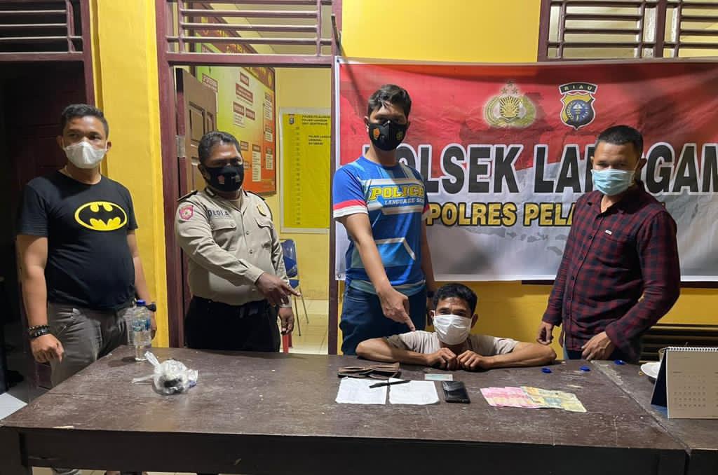 Polsek Langgam Bekuk Pelaku Judi Togel