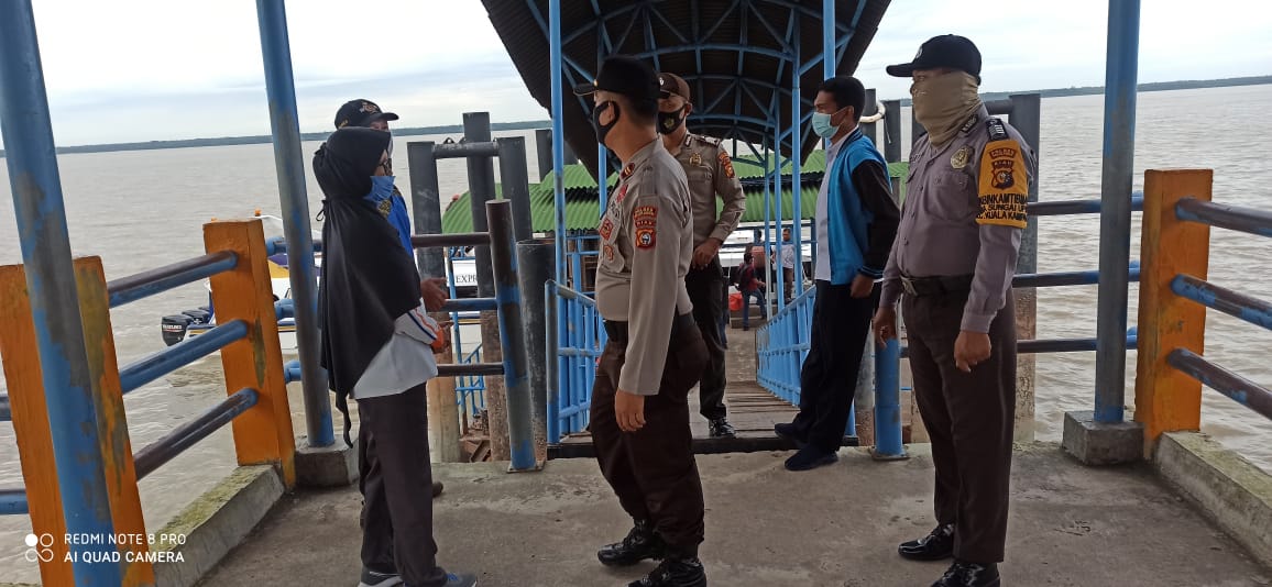 Cegah Covid-19, Polsek Kuala Kampar Imbau Penumpang Kapal Gunakan Masker